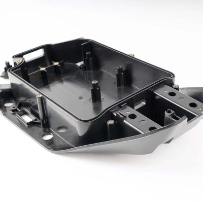 rapid plastic injection molded part with inserts and bosses