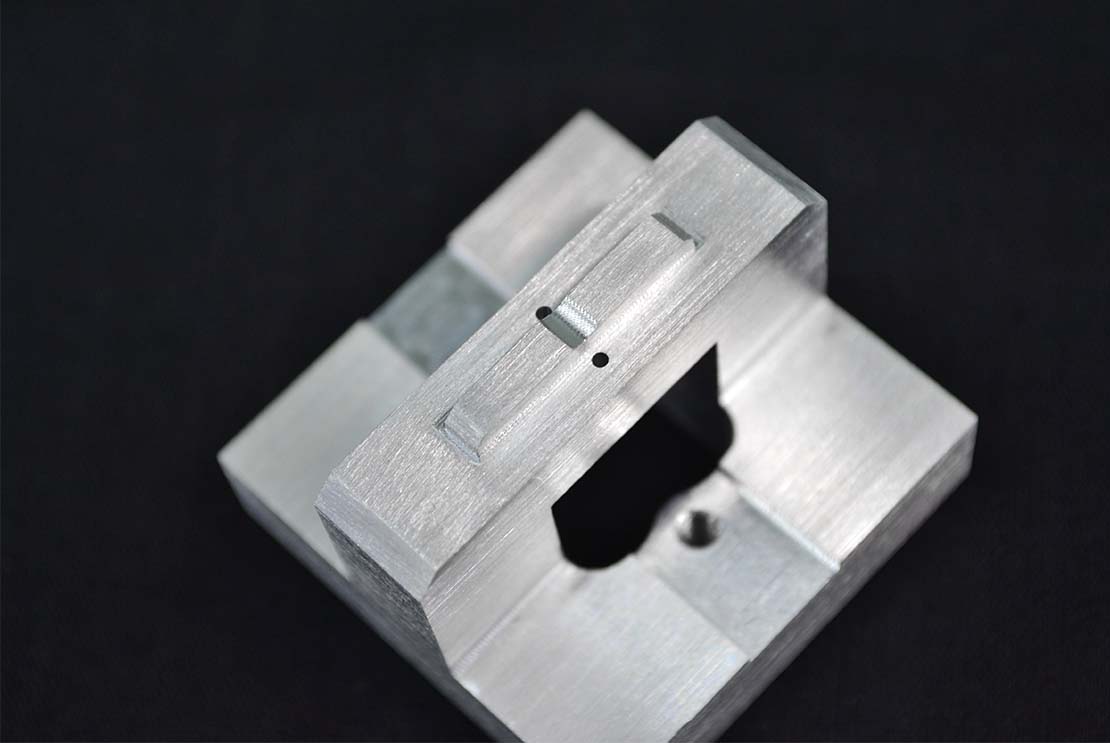 What is anodizing and what does an anodized part look like?