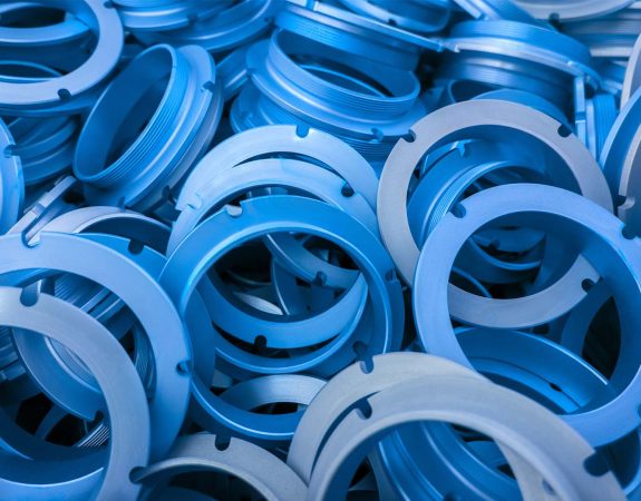 parts with blue anodized finish