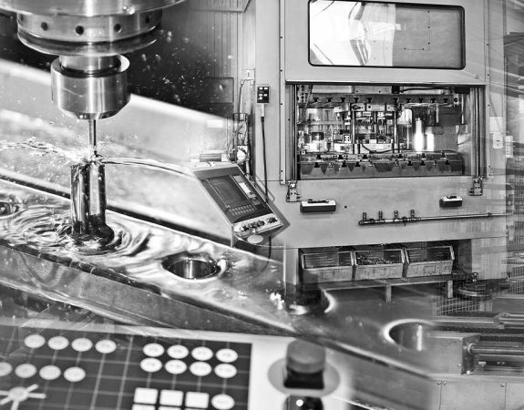 outsource manufacturing to lower costs and focus on core competencies